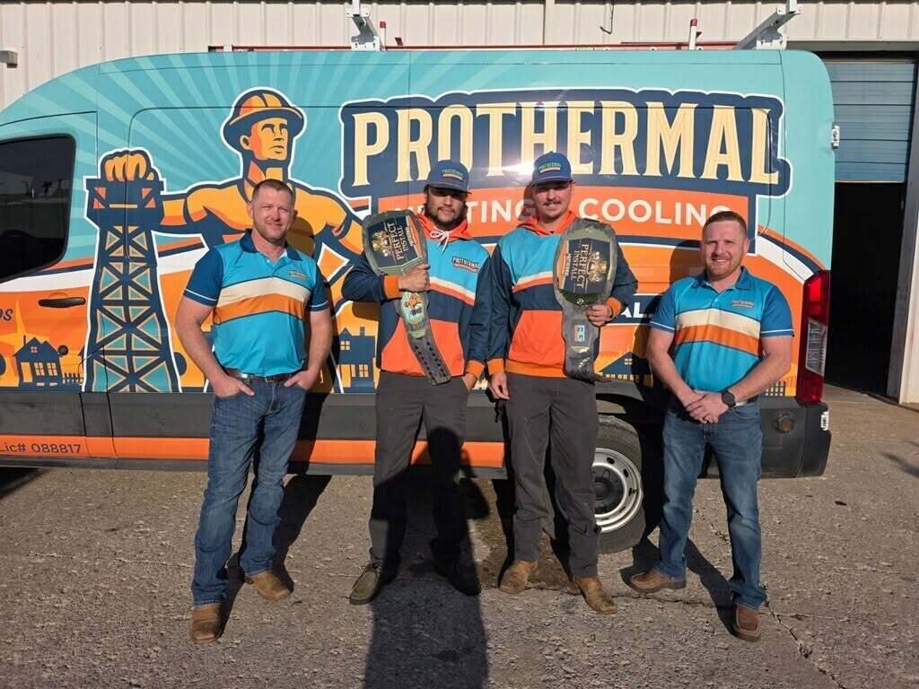 Prothermal Heating and Cooling team with their wrapped van